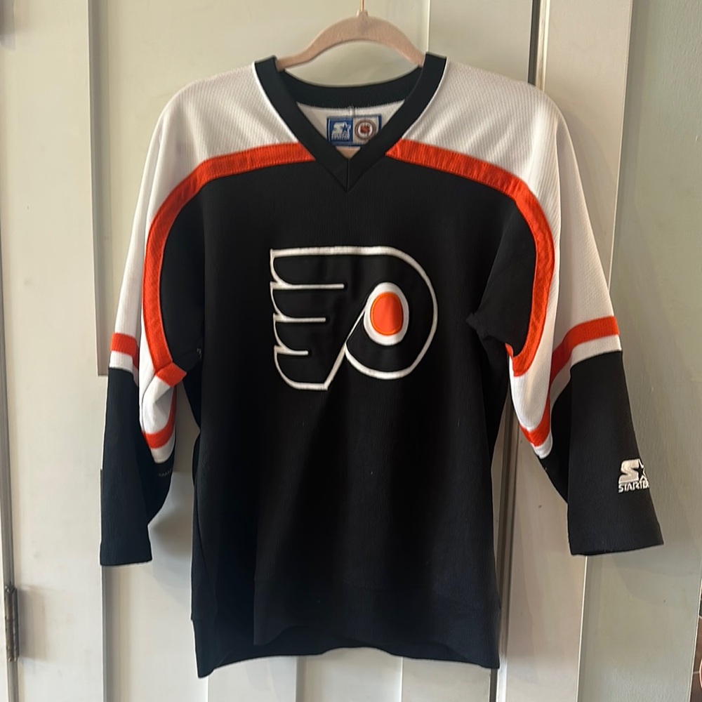 Black and White Hockey Jersey with Orange Accents